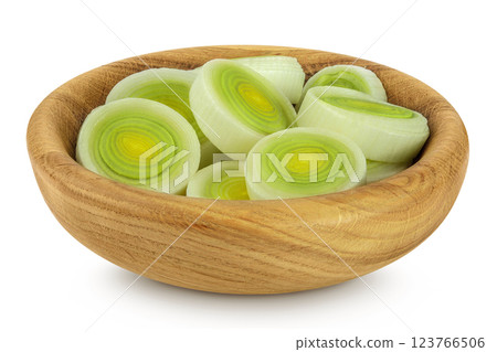 sliced Leek vegetable in wooden bowl isolated on white background with full depth of field sliced Leek vegetable in wooden bowl isolated on white background with full depth of field 123766506