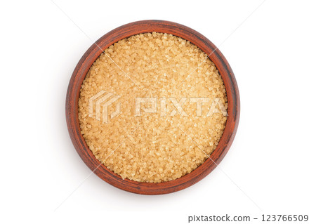 The brown sugar in ceramic bowl isolated on white background. Top view. Flat lay The brown sugar in ceramic bowl isolated on white background. Top view. Flat lay 123766509