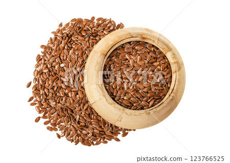 flaxseed in wooden bowl isolated on white background. Top view. Flat lay flaxseed in wooden bowl isolated on white background. Top view. Flat lay 123766525