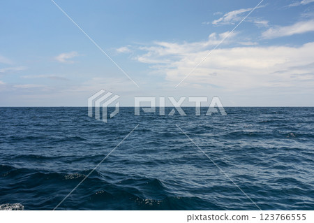 Side view from boat in Indian ocean sailing between Seychelles islands in daytime Side view from boat in Indian ocean sailing between Seychelles islands in daytime 123766555