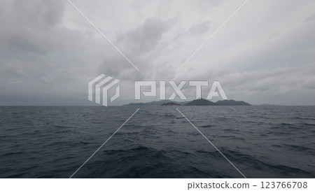 Front view from boat in Indian ocean sailing between Seychelles islands before storm Front view from boat in Indian ocean sailing between Seychelles islands before storm 123766708