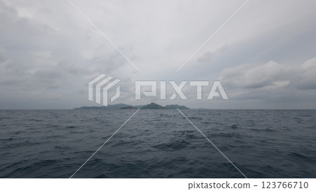Front view from boat in Indian ocean sailing between Seychelles islands before storm Front view from boat in Indian ocean sailing between Seychelles islands before storm 123766710