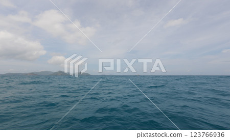 Front view from boat in Indian ocean sailing between Seychelles islands in daytime Front view from boat in Indian ocean sailing between Seychelles islands in daytime 123766936