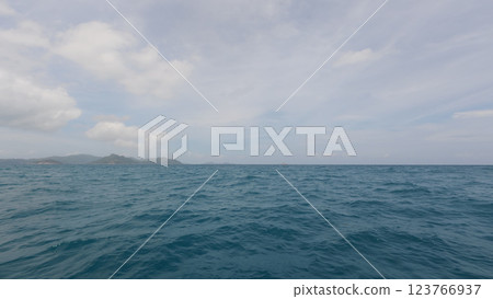 Front view from boat in Indian ocean sailing between Seychelles islands in daytime Front view from boat in Indian ocean sailing between Seychelles islands in daytime 123766937