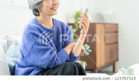 Senior women with a smartphone 123767323