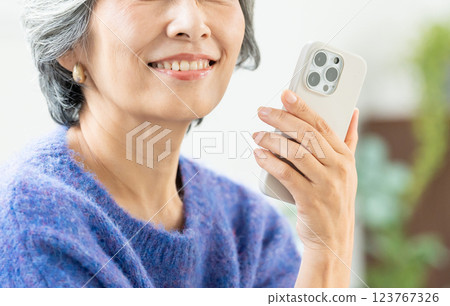 Senior women with a smartphone Senior women with a smartphone 123767326