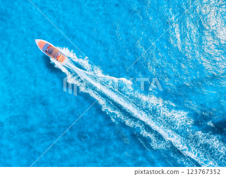 Drone view on fast boat on blue Mediterranean sea at sunny day. Vacation and leisure 123767352