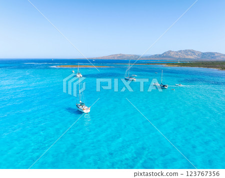 Drone view of a sailing yacht. Vacationing people. Summer time for sea travel.  123767356