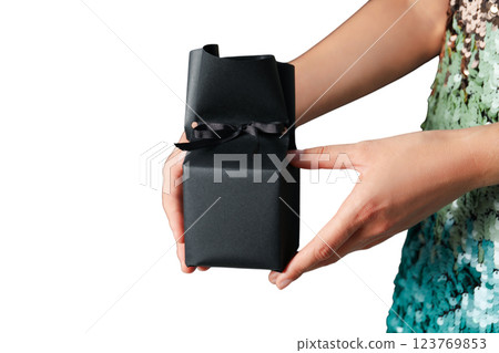 PNG, Black Friday, gift box in hands, isolated on white background. PNG, Black Friday, gift box in hands, isolated on white background. 123769853