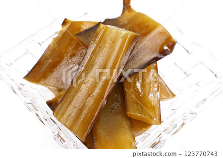 Fresh stem Kelp wakame isolated on white background. Japanese food. Fresh stem Kelp wakame isolated on white background. Japanese food. 123770743