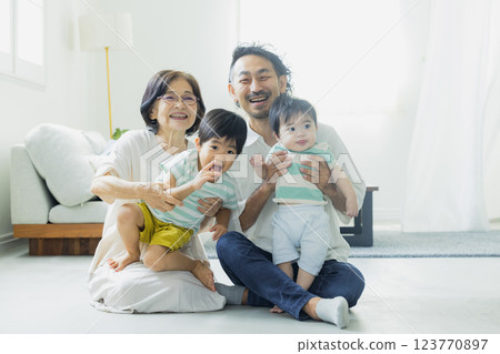 Three generations of family in the living room Three generations of family in the living room 123770897