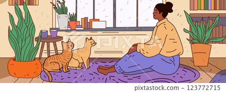 Person with cats relaxing in cozy room featuring indoor plants colorful books and soft lighting home comfort and tranquility 123772715