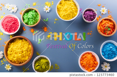 Happy Holi decoration, the indian festival.Top view of colorful holi powder on dark blue background. 123773460