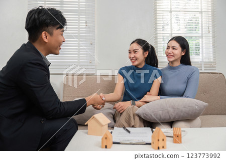 Real Estate Planning. Engaging consultation between professionals and clients, showcasing agreement on property matters. Real Estate Planning. Engaging consultation between professionals and clients, showcasing agreement on property matters. 123773992