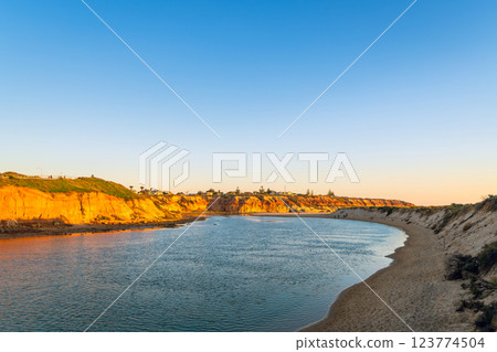 Onkaparinga River in South Port during sunset time Onkaparinga River in South Port during sunset time 123774504