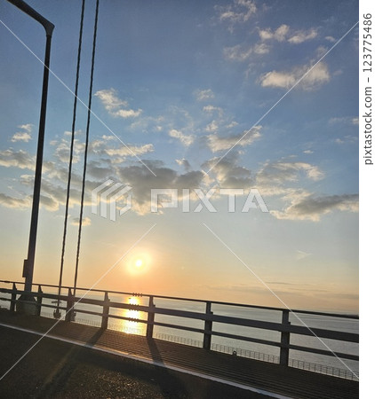 Sunset over the sea 123775486