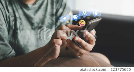 woman using smartphone and touch icon social media for online marketing, work from anywhere. technology internet networking, playing social media and living on holiday concept. 123775690