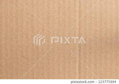 Brown cardboard sheet abstract background, texture of recycle paper box in old vintage pattern for design art work. Brown cardboard sheet abstract background, texture of recycle paper box in old vintage pattern for design art work. 123775894