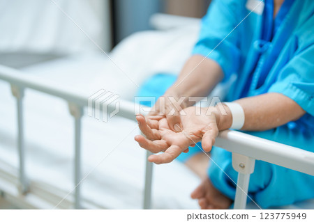 Elderly asian Patient Woman recovery after surgery. Happy Senior illness resting in hospital. Influenza, Fever, treatment, Insurance, Health care and medical, world day of Sick and Health day concept Elderly asian Patient Woman recovery after surgery. Happy Senior illness resting in hospital. Influenza, Fever, treatment, Insurance, Health care and medical, world day of Sick and Health day concept 123775949