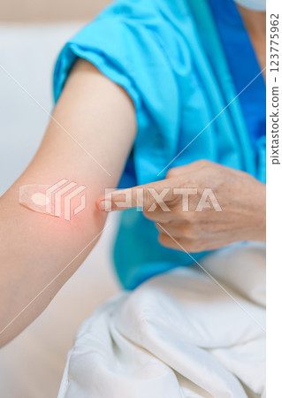 Elderly asian Patient Woman with medical patch plaster after blood test in hospital. Diagnose, illness, treatment, Insurance, Healthcare, medical Examination, Blood donation and World Blood Donor Day Elderly asian Patient Woman with medical patch plaster after blood test in hospital. Diagnose, illness, treatment, Insurance, Healthcare, medical Examination, Blood donation and World Blood Donor Day 123775962
