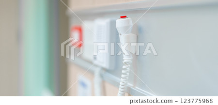 emergency button in hospital room, calling nurse in emergency case. Professional Medical system and Safety Alert emergency button in hospital room, calling nurse in emergency case. Professional Medical system and Safety Alert 123775968