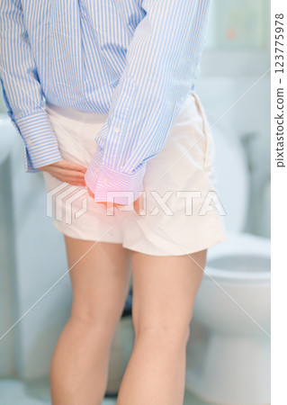 woman have abdomen pain or Stomachache in toilet due to Acute or Chronic Diarrhea from food poisoning digestion, constipation, Viral gastroenteritis, Celiac disease and Malabsorption and Hemorrhoids woman have abdomen pain or Stomachache in toilet due to Acute or Chronic Diarrhea from food poisoning digestion, constipation, Viral gastroenteritis, Celiac disease and Malabsorption and Hemorrhoids 123775978
