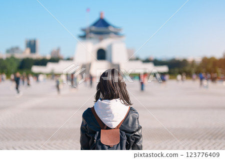 woman traveler visiting in Taiwan, female Tourist sightseeing at National Chiang Kai shek Memorial or Hall Freedom Square, Taipei City. Popular landmark and attractions. Asia Travel concept woman traveler visiting in Taiwan, female Tourist sightseeing at National Chiang Kai shek Memorial or Hall Freedom Square, Taipei City. Popular landmark and attractions. Asia Travel concept 123776409