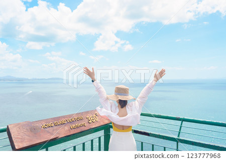 Woman tourist traveling in Krabi, Thailand. happy traveller enjoy and sightseeing view at koh Hong island viewpoint. summer trip, destination, Southeast Asia Travel, vacation and holiday concept 123777968