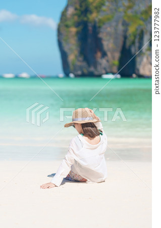 Woman tourist traveling and sightseeing in Krabi, Thailand, happy traveller enjoy at Maya Bay beach on Phi Phi island, Popular paradise island, destination, Southeast Asia Travel, vacation and holiday Woman tourist traveling and sightseeing in Krabi, Thailand, happy traveller enjoy at Maya Bay beach on Phi Phi island, Popular paradise island, destination, Southeast Asia Travel, vacation and holiday 123777982