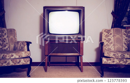An old TV as a center of home warmth and harmony, vintage comfort 123778393