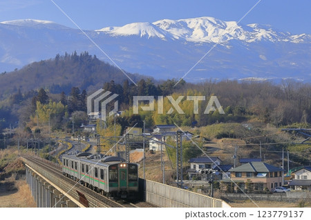 Snow-capped Azuma Mountain Range and the Tohoku Main Line 123779137