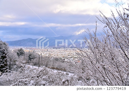 Winter scenery of the Shinonoi Line and Chikuma city Winter scenery of the Shinonoi Line and Chikuma city 123779419