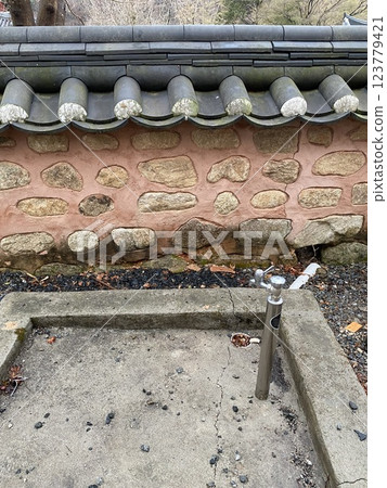 "Water Faucet in a Temple" 123779421