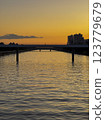 River and bridge at dusk 123779679