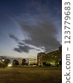 Square and apartment building at dusk 123779683