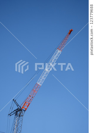Blue sky and crane on construction site 123779688