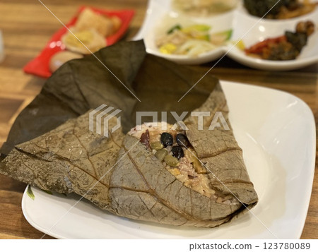 "Fragrant Lotus Leaf Rice: A Traditional Korean Culinary Delight" "Fragrant Lotus Leaf Rice: A Traditional Korean Culinary Delight" 123780089