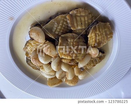"Abalone with Garlic and Olive Oil: A Savory Seafood Dish" "Abalone with Garlic and Olive Oil: A Savory Seafood Dish" 123780225