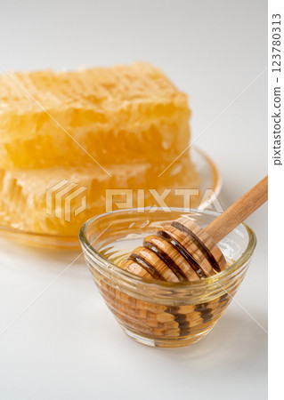 Beautiful honey and beehive comb honey Beautiful honey and beehive comb honey 123780313