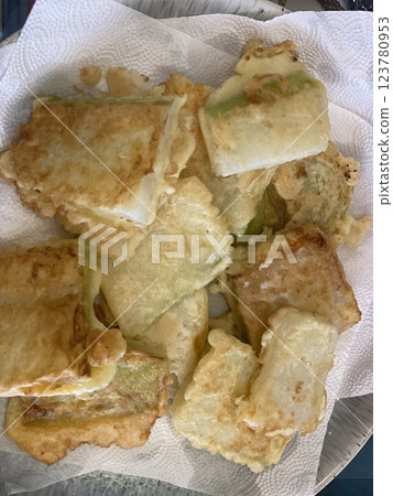 "Fried Moo (Radish) Pancake: A Crispy Korean Delight" "Fried Moo (Radish) Pancake: A Crispy Korean Delight" 123780953