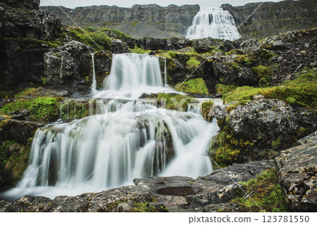 Dynjandi is one the most famous waterfall of the West Fjords of Iceland at summer 123781550