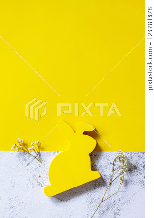 Happy Easter mockup. Easter bunny on slate background. Illuminating Yellow and Ultimate Gray Color of the year 2021. Top view flat lay background. Happy Easter mockup. Easter bunny on slate background. Illuminating Yellow and Ultimate Gray Color of the year 2021. Top view flat lay background. 123781878