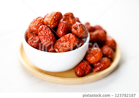 Dried red Chinese dates, jujube in a bowl 123782187