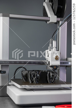 3D printing machine, 3D printer prints a new model 3D printing machine, 3D printer prints a new model 123782259