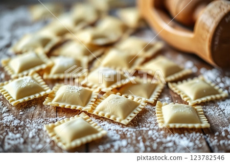 Artisanal Italian Handcrafted Ravioli Pasta with Traditional Crimped Edges on Rustic Wooden Surface A Culinary Craftsmanship Display 123782546