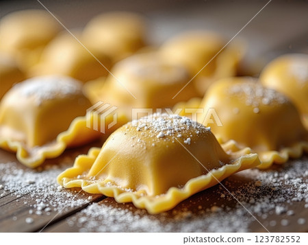 Artisanal Italian Handcrafted Ravioli Pasta with Traditional Crimped Edges on Rustic Wooden Surface A Culinary Craftsmanship Display 123782552