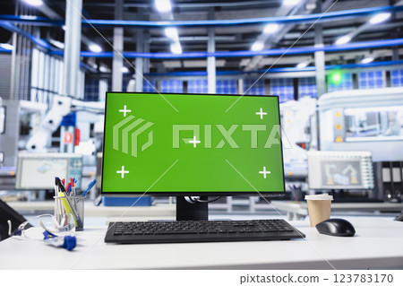 Chroma key mockup PC monitor in photovoltaics factory used for analyzing data and reviewing system metrics. Green screen computer in solar panels plant troubleshooting technical issues 123783170