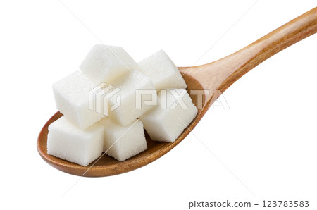 Sugar cubes in a wooden spoon close-up on a white. Isolated Sugar cubes in a wooden spoon close-up on a white. Isolated 123783583