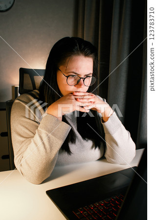 Tired new entrepreneur trying to deal with business problems. Upset businesswoman feeling tired of unsuccess selling products. Woman with laptop. Online business concept. Tired new entrepreneur trying to deal with business problems. Upset businesswoman feeling tired of unsuccess selling products. Woman with laptop. Online business concept. 123783710