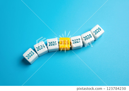 The year 2026 stands out clearly in the chain. Significant marker in timelines, plans, or forecasts. Key events, milestones, or economic changes. 123784230